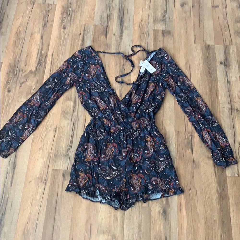 Tillys romper size small with tags still on!